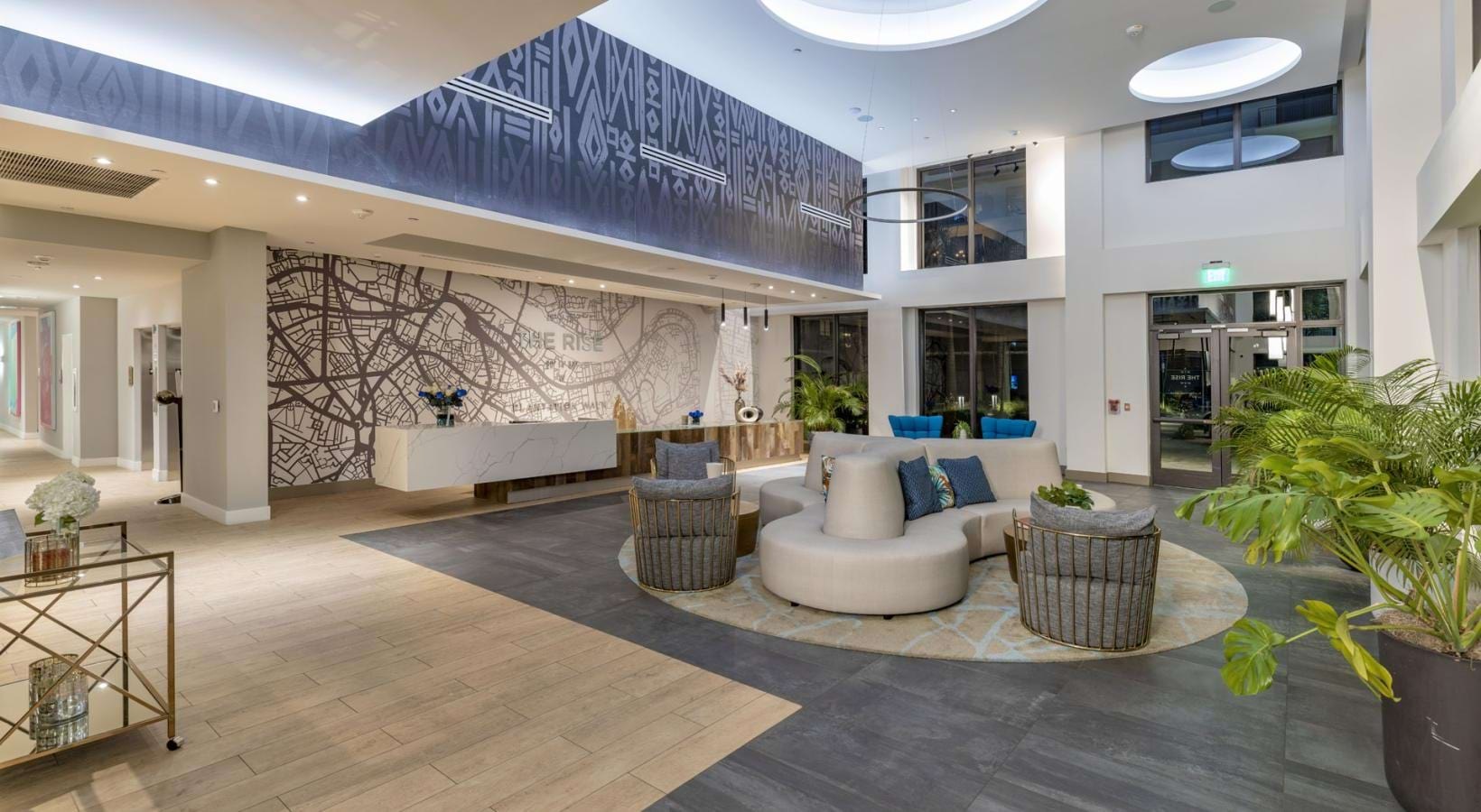 Access to resident-only features a room with a couch and chairs