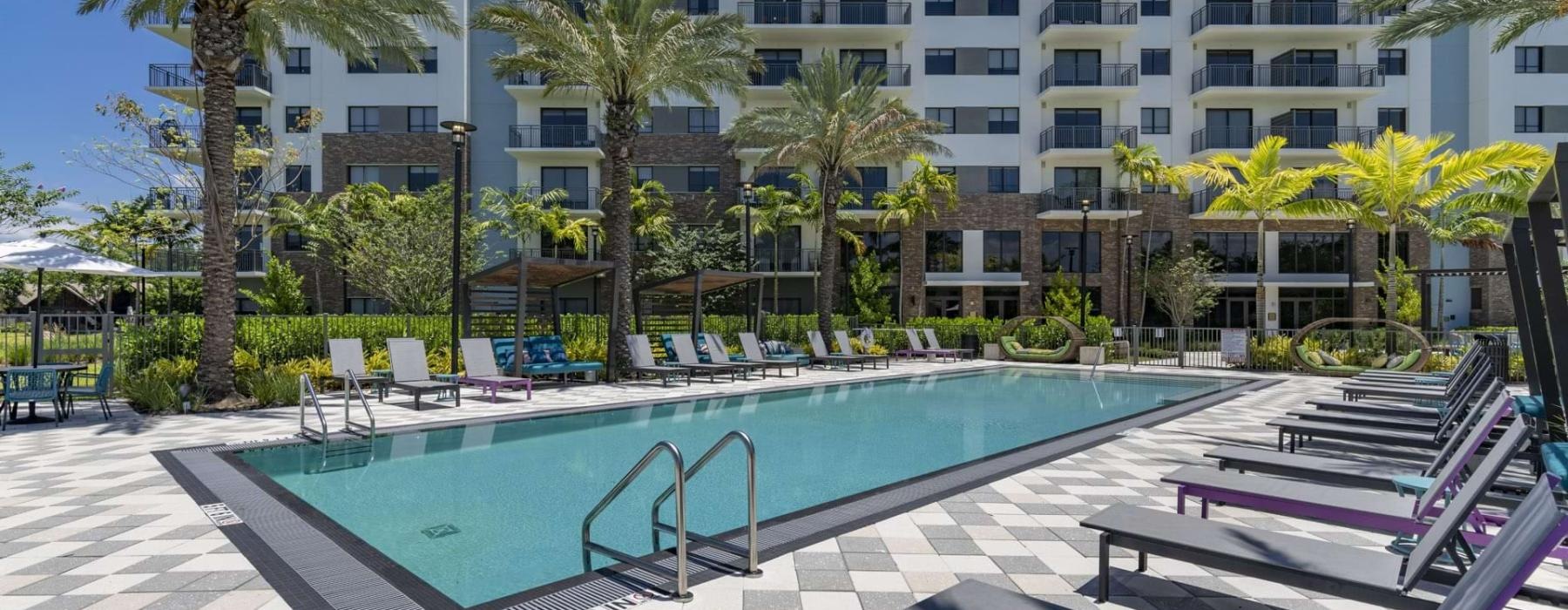 a pool in front of a building