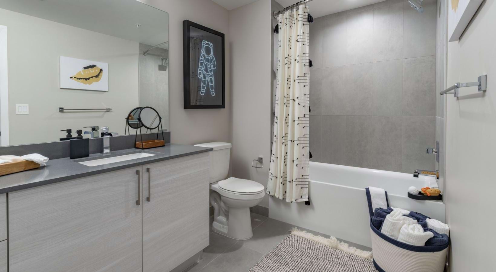Bathroom options with thoughtful details a bathroom with a tub toilet and sink