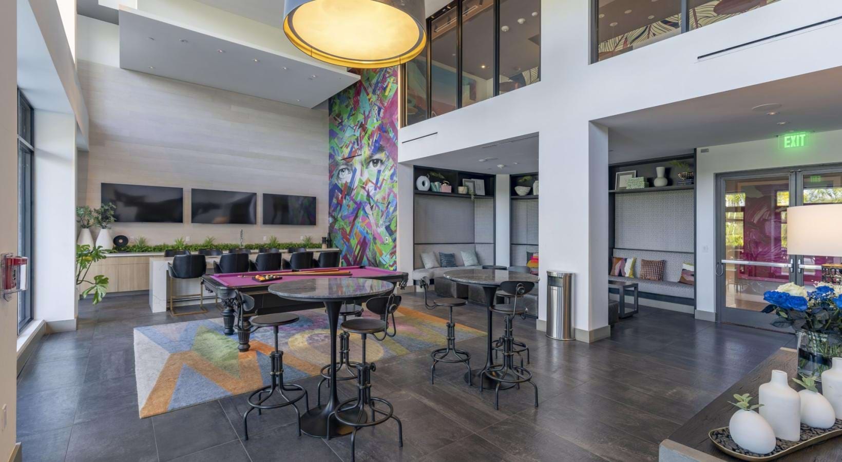 Everything within reach a room with tables and chairs