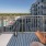 balcony with chair overlooking pool