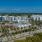 arial view of building with trees surrounding