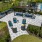 Outdoor lounge area next to a swimming pool